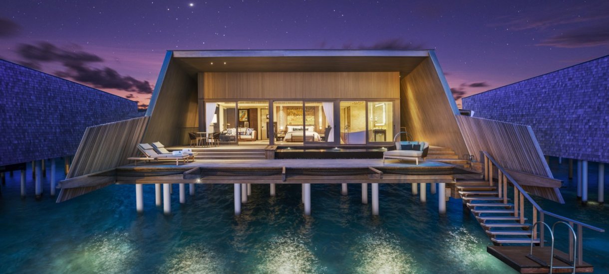 St. Regis Vommuli Resort Sunset overwater villa