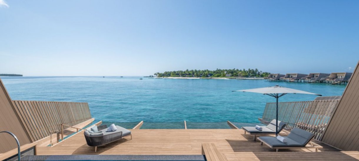 St. Regis Vommuli Resort Sunset overwater villa